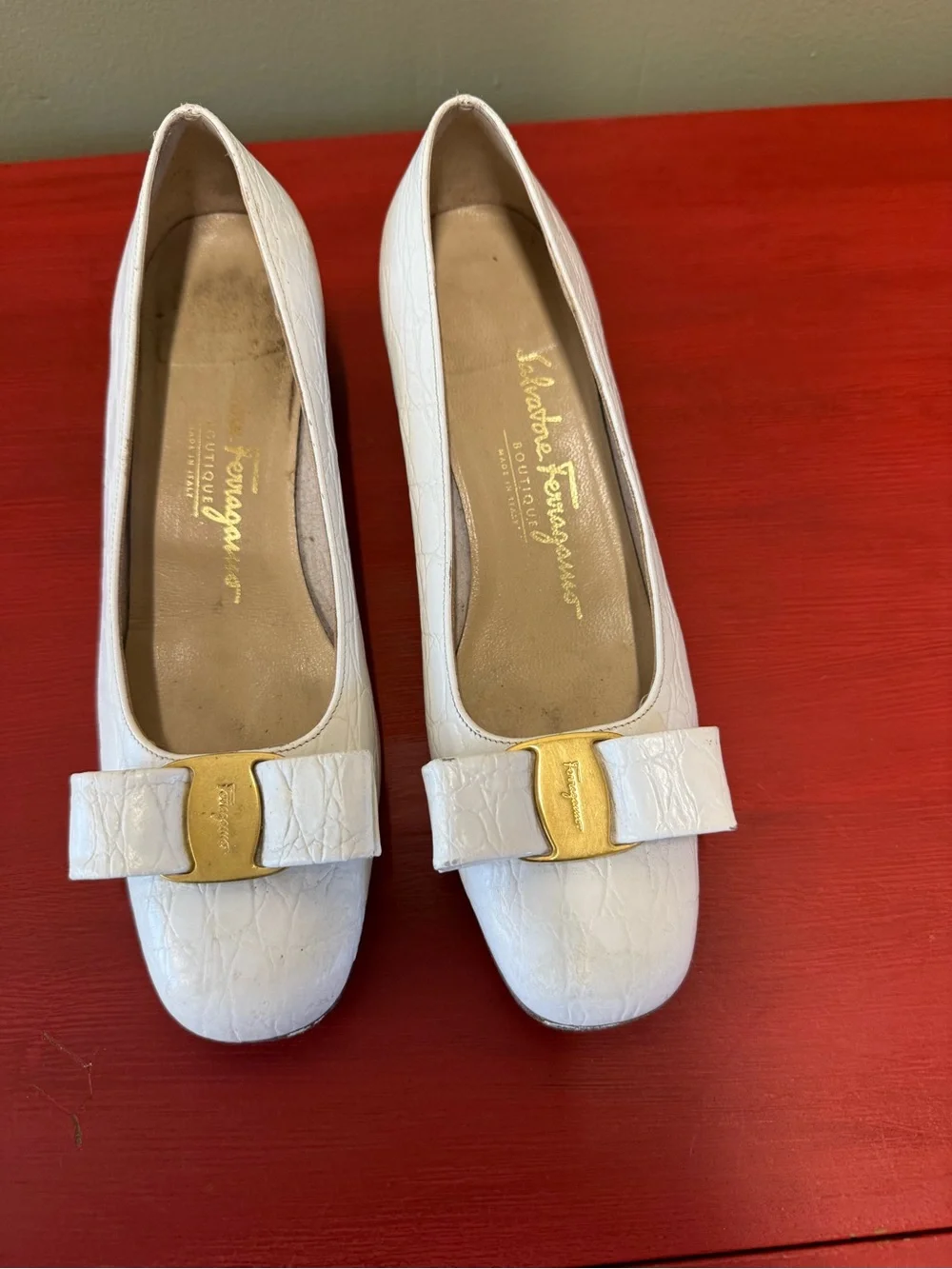 Salvatore Ferragamo White Leather Vara Bow Flats with Gold Accent